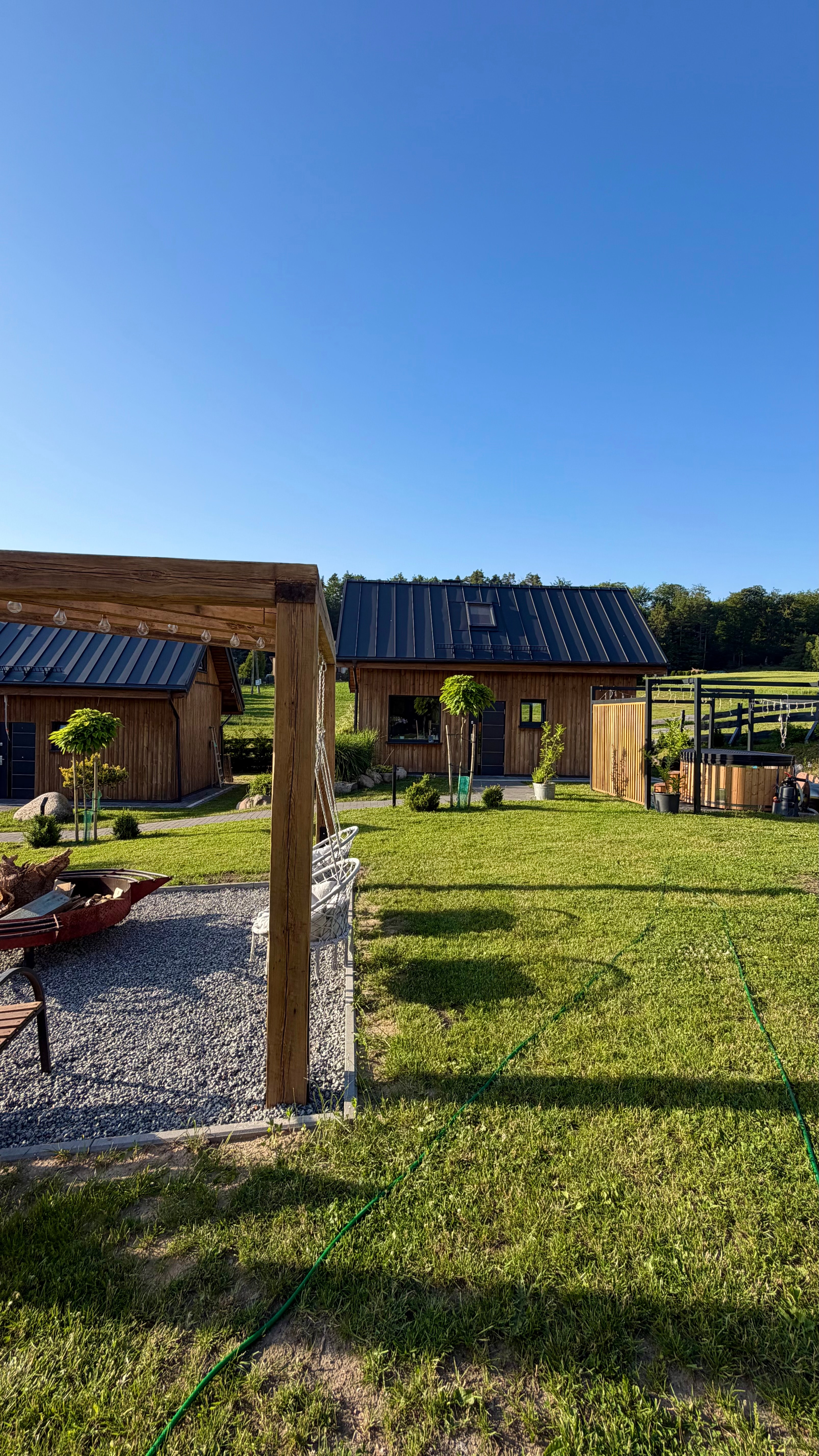 Ogród, pergola i drewniane domki Siedliska